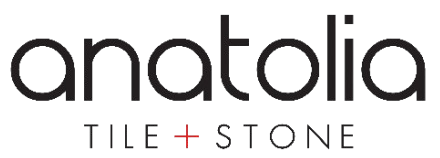 Logo for Anatolia Tile + Stone featuring the word "anatolia" in a bold, black, lowercase sans-serif font. Below it, the words "TILE + STONE" are written in a smaller, spaced-out black font, with the plus sign highlighted in red.